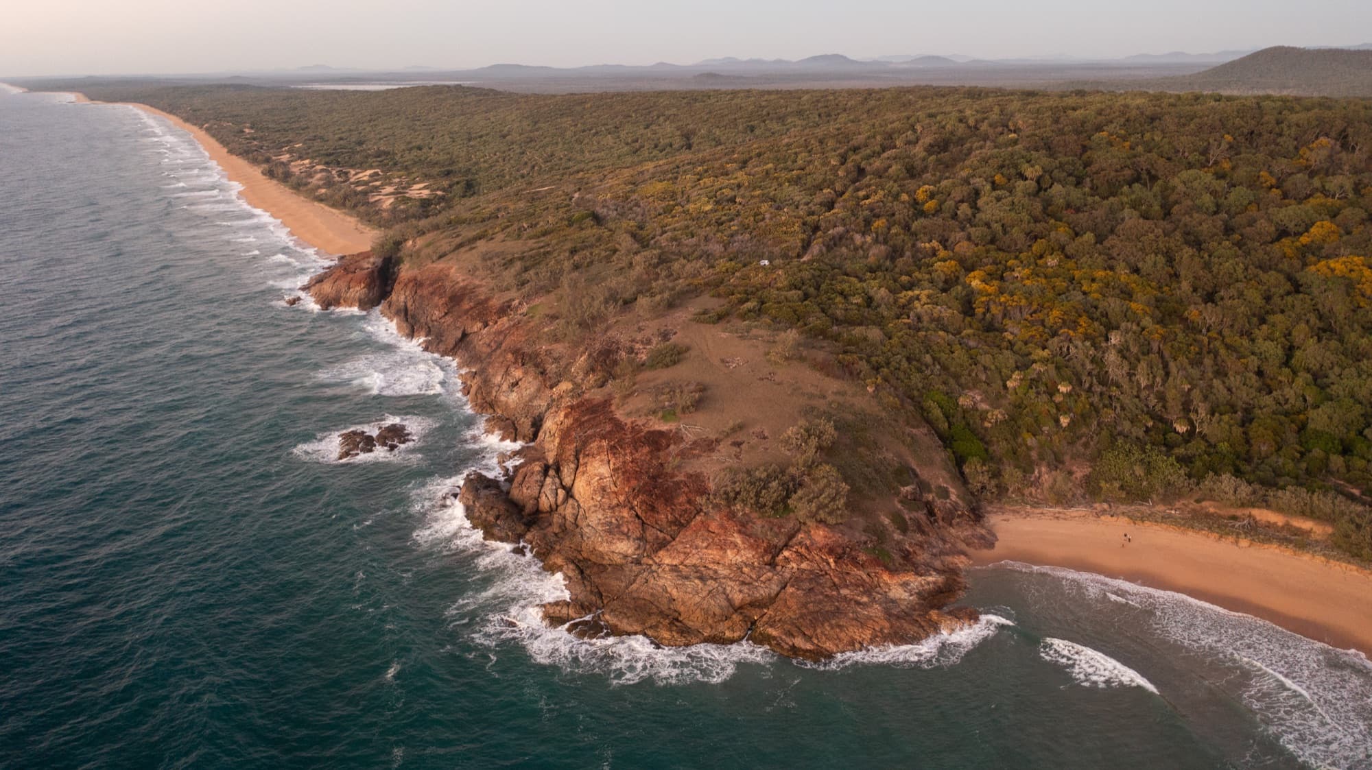 The red rock of the headland